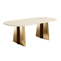 Moderne ovalen eettafel met gouden gepolijste onderstel en lichte houten top